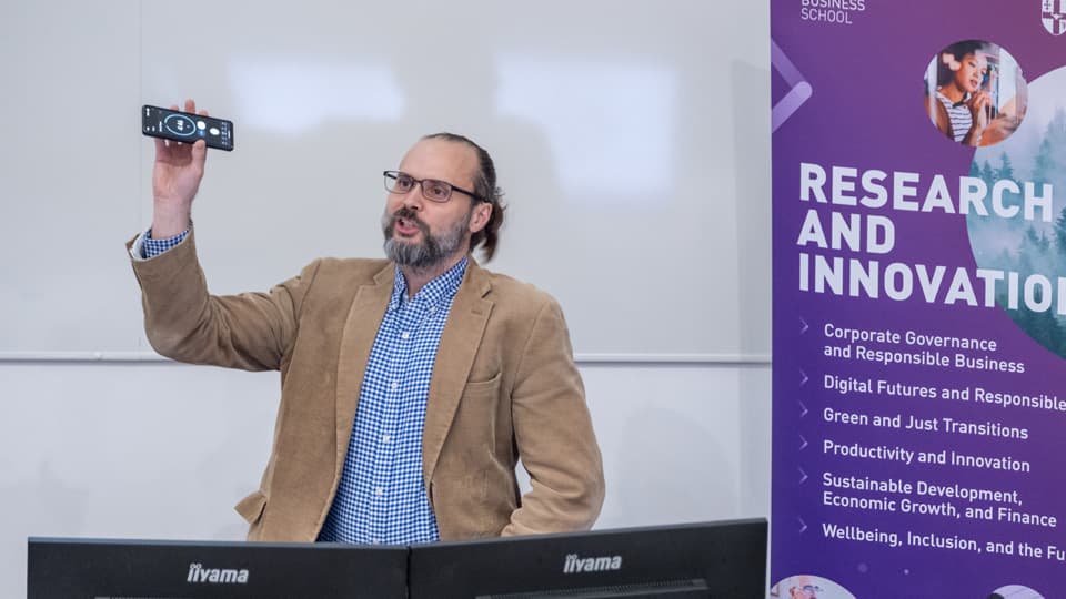 Dr Martin Sykora presents to the Loughborough Business School research themes launch audience.